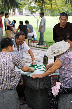 Chinese playing Mahjong